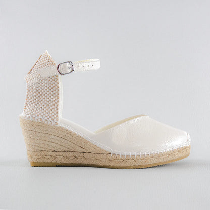 Alpargatas novia piel blanco relieve cuña yute Laan Barcelona