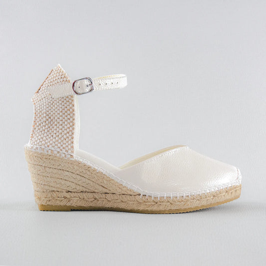 Alpargatas novia piel blanco relieve cuña yute Laan Barcelona